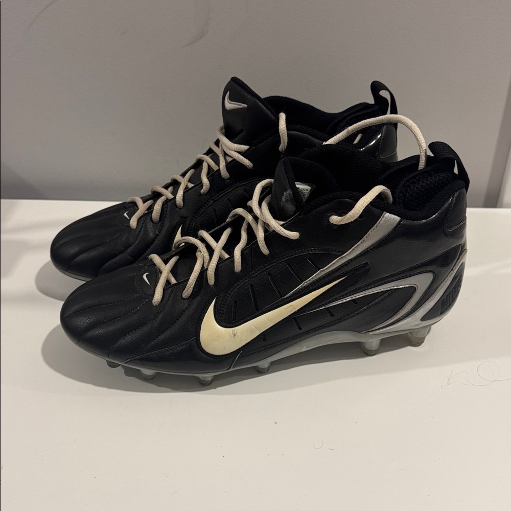 Nike Super Speed D Low football cleats in a black and white colorway